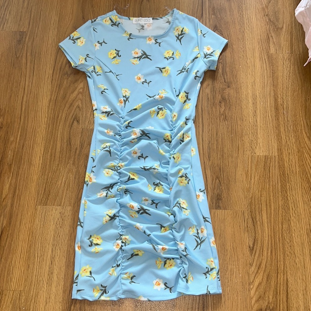 A beach dress with flowers on it